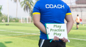 Youth-soccer-coach using the play-practice-play methodology