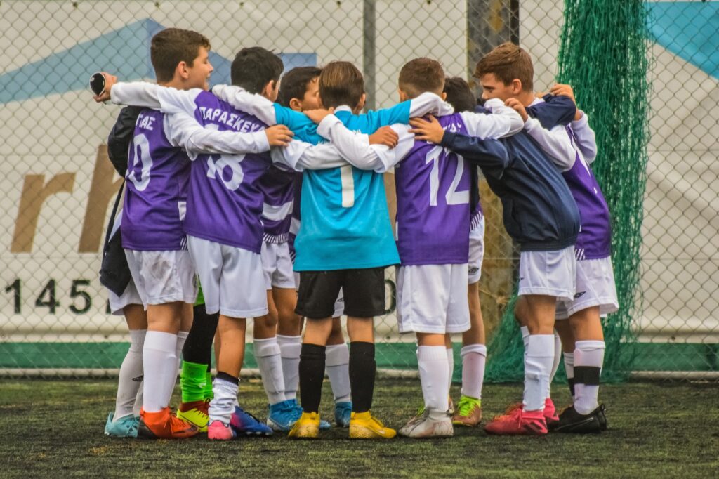 Youth soccer team in a huddle